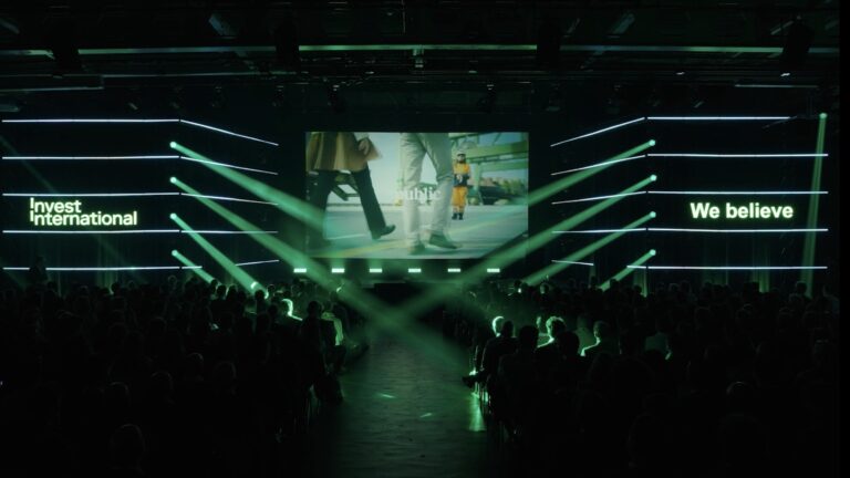 Conference stage with green lighting