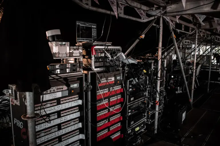 Power and data distribution racks feeding the mainstage lighting rig at Lux Expo